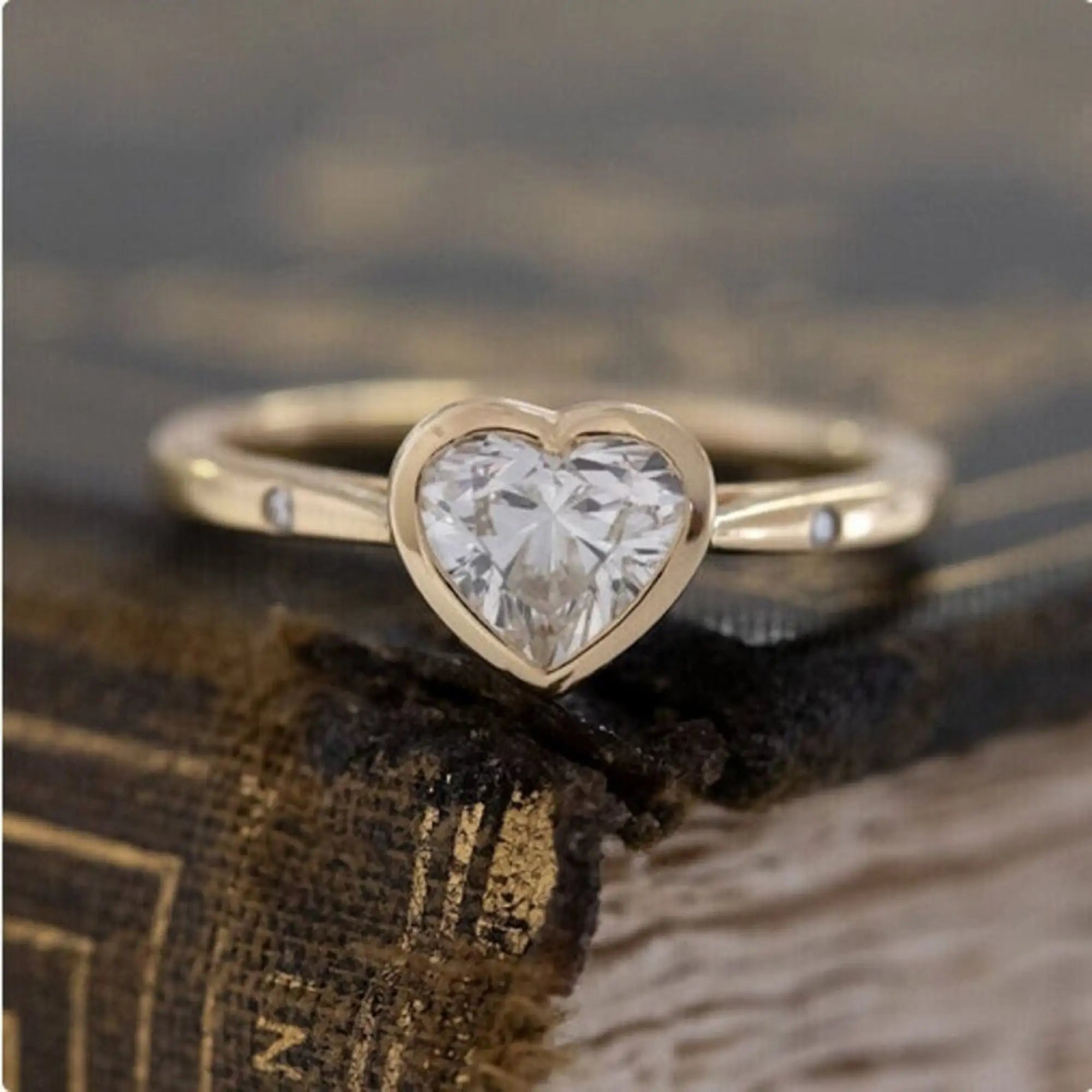 1.5 Carat Heart Shaped Moissanite Solitaire Ring with Floating Rounds Tapered Band Symbolic Bezel Set Gemstone Rings