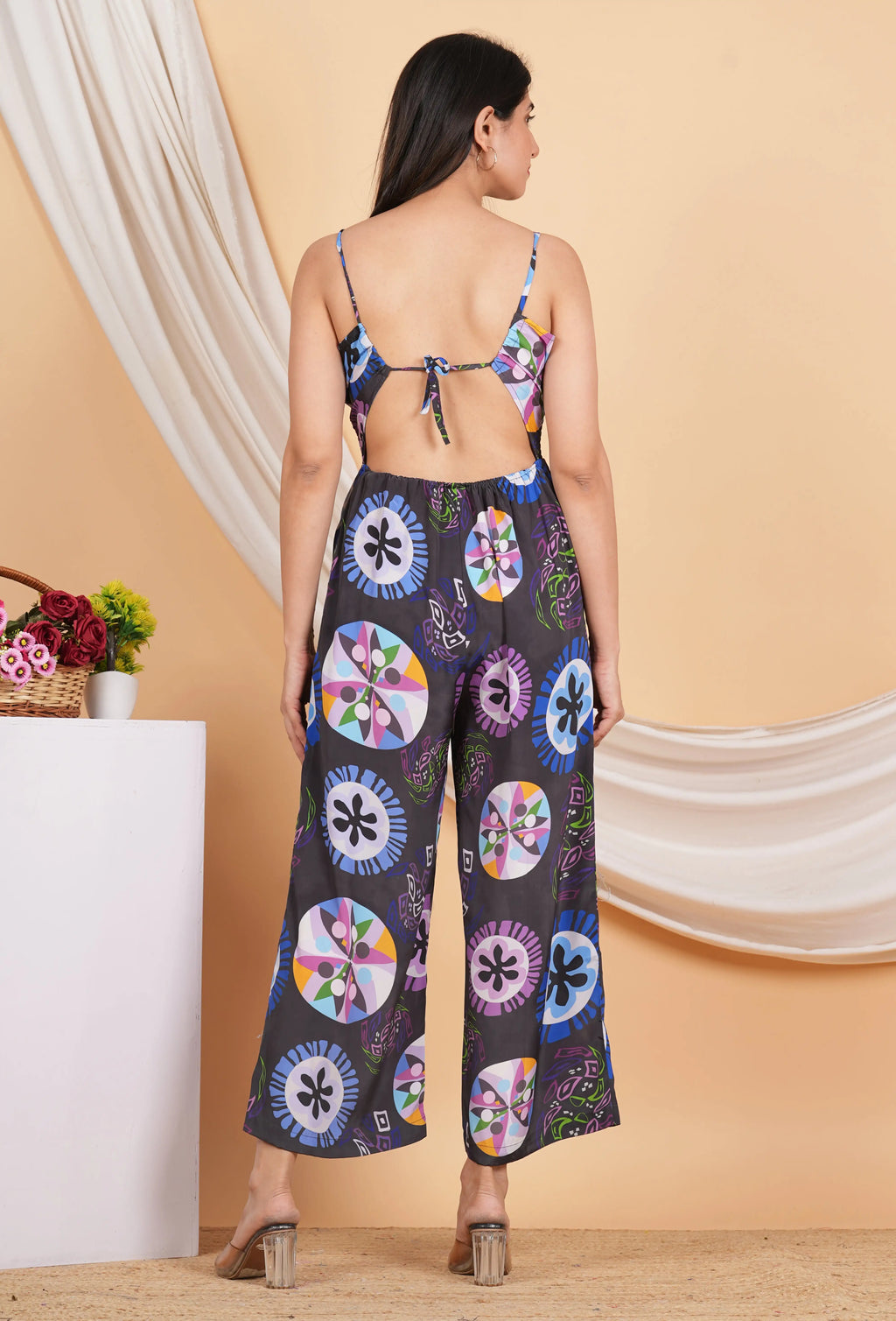Womens black geometrical printed polyester jumpsuit with smoking embroidered detailing designed stylish comfortable daily wear