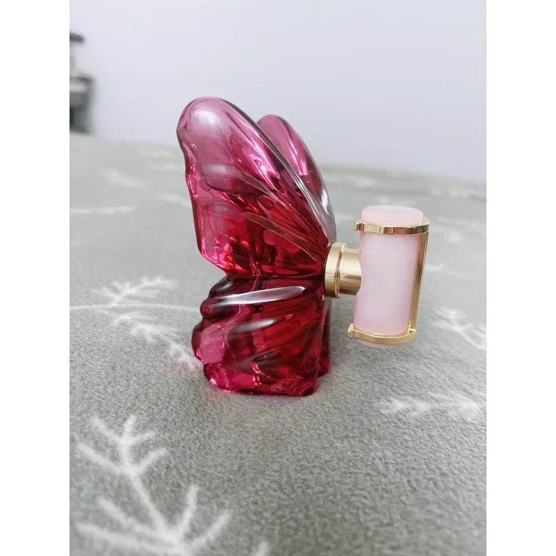 LA Bom. b.A 2.7oz female perfume, fresh flower and fruit fragrance, dragon fruit integration, unique butterfly desi.gn