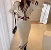 Wholesale 2026 Autumn New Temperament V-neck Bordered Contrast Color Knitted Cardigan Sweater and High Waist Mid-length Sets