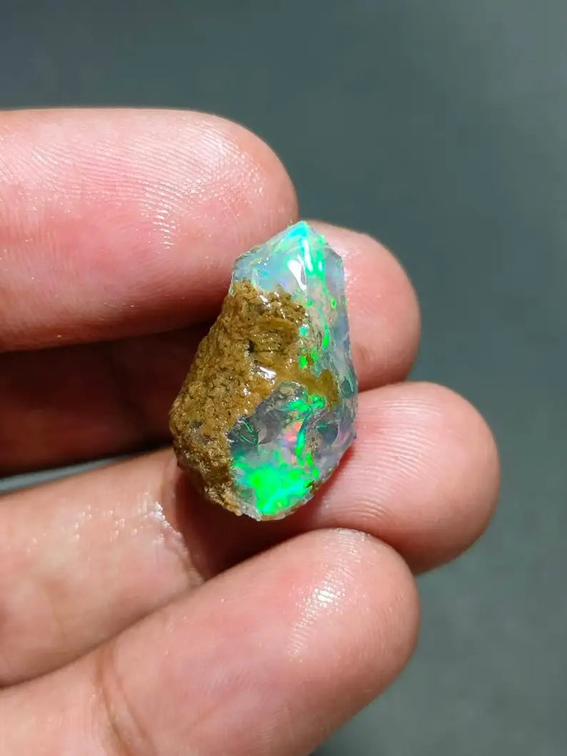 AAA Grade Natural Ethiopian opal oily rough welo opal for jewelry making  White Base opal with Multi and Green Fire