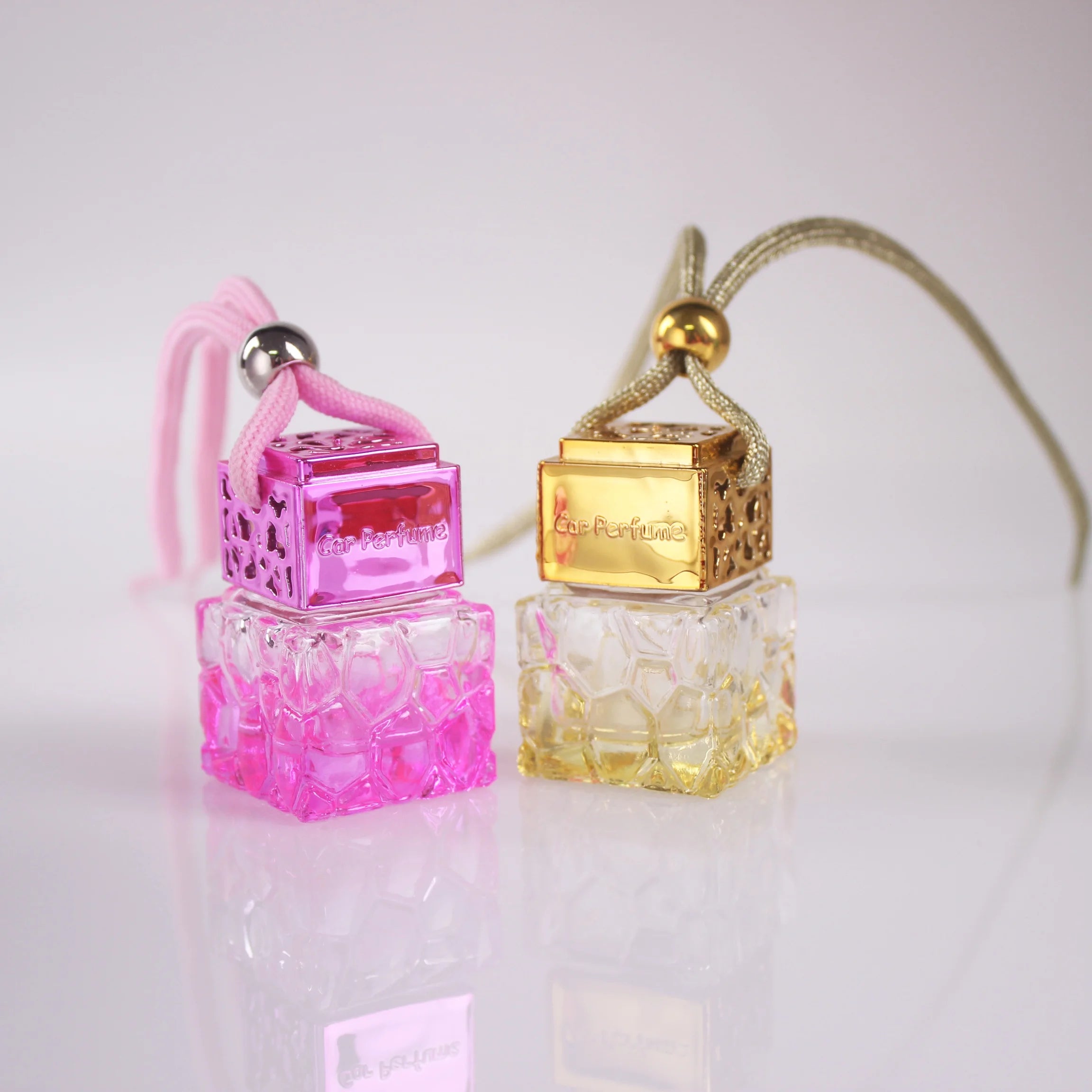 Exquisite 8ml Tinted Honeycomb Shape Car Perfume Bottle Gold Pink Blue Glass Aromatherapy Diffusers for Hanging in Cars