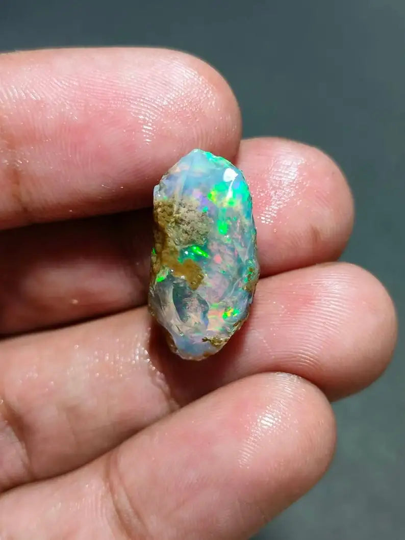 AAA Grade Natural Ethiopian opal oily rough welo opal for jewelry making  White Base opal with Multi and Green Fire