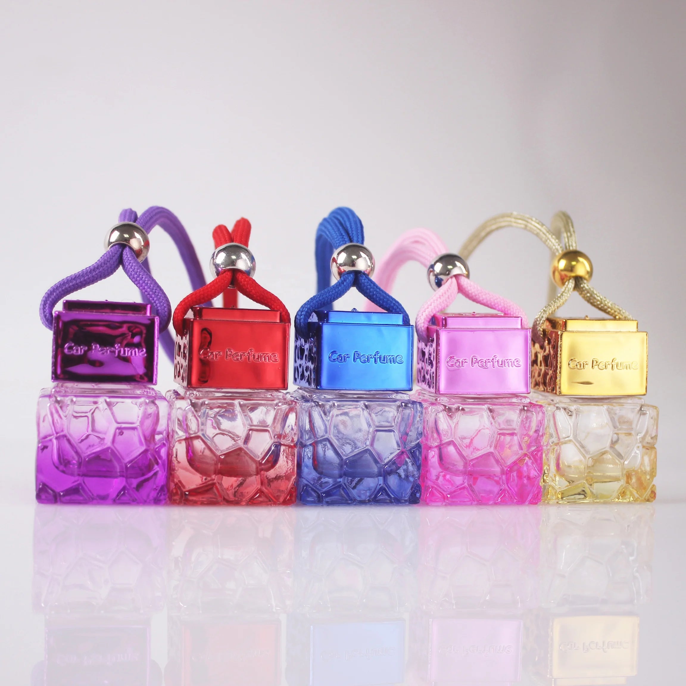 Exquisite 8ml Tinted Honeycomb Shape Car Perfume Bottle Gold Pink Blue Glass Aromatherapy Diffusers for Hanging in Cars