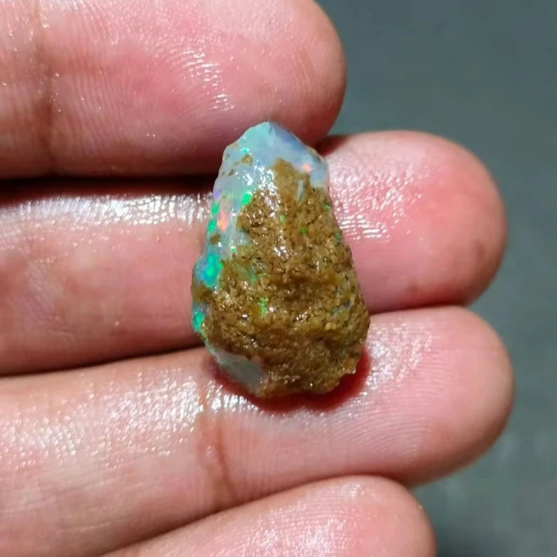 AAA Grade Natural Ethiopian opal oily rough welo opal for jewelry making  White Base opal with Multi and Green Fire