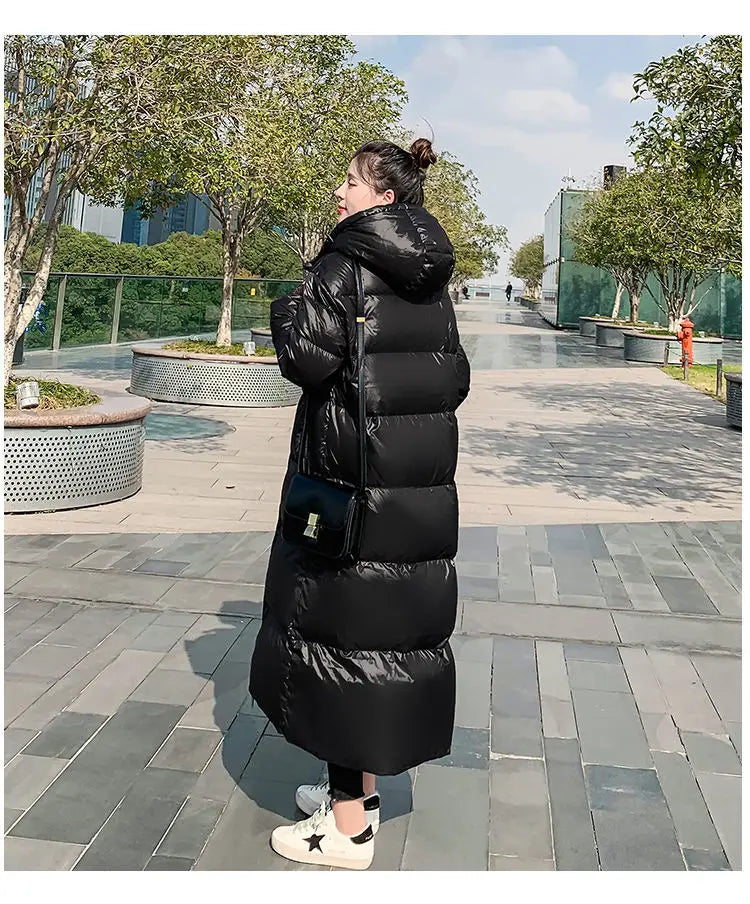 2026 New Thicken Snow Parkas Fashion Windproof Glossy Down Cotton Hooded Women Jacket Winter Loose Long Coat 4XL Ladies Outwear