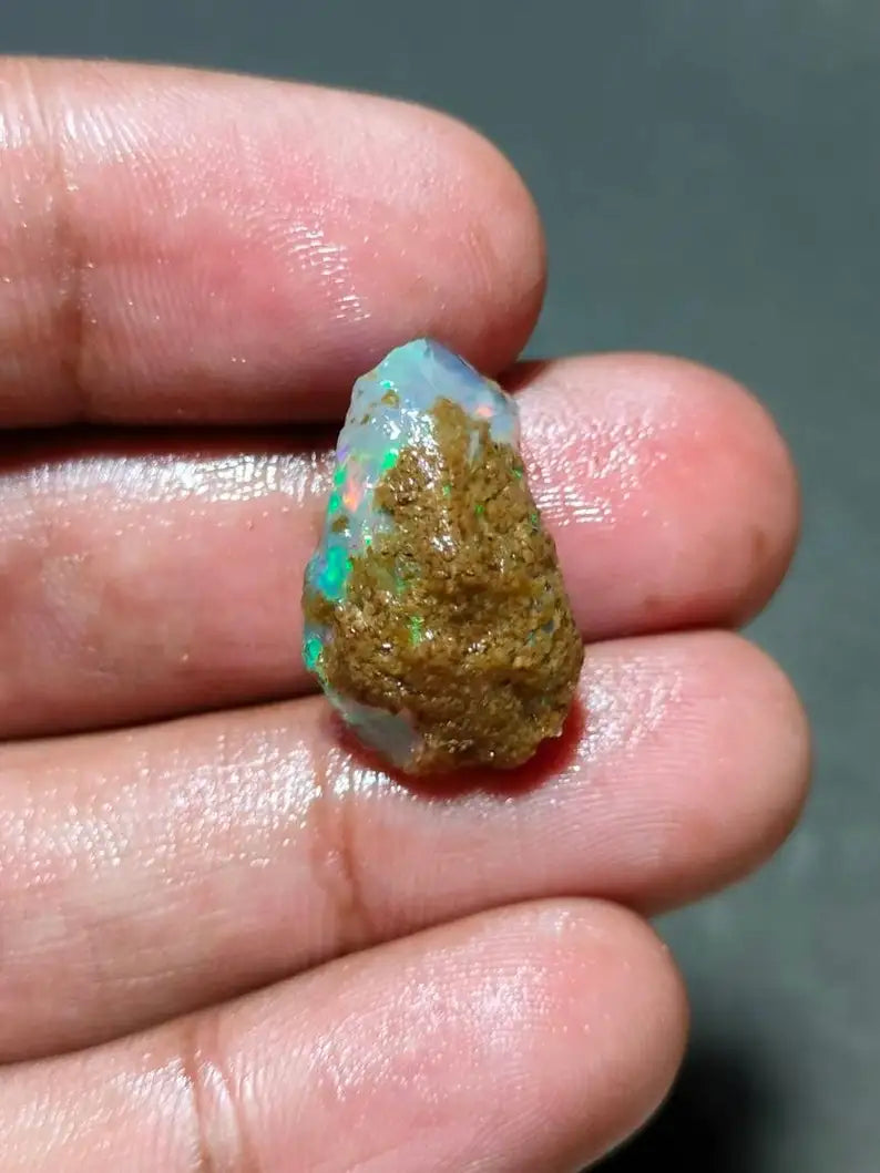 AAA Grade Natural Ethiopian opal oily rough welo opal for jewelry making  White Base opal with Multi and Green Fire