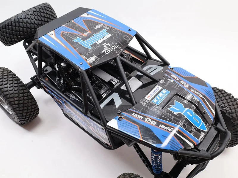 RR10 Bomber 1/10 4WD Rock Racer RTR RC Rock Crawler with Spektrum Radio System LED Lights and Full Tube Chassis AXI03016