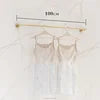 Wholesale Boutique Clothing Stand Golden Stainless Steel Clothing Shelving Rack Luxury Clothing Wall Racks for Garment Shop