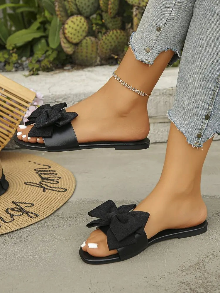 Womens Slip on Flat Sandals Big Bowknot Wide Strap Slides Mules Open Toe Casual Sweet Summer Beach Comfort Daily Walking Shoes