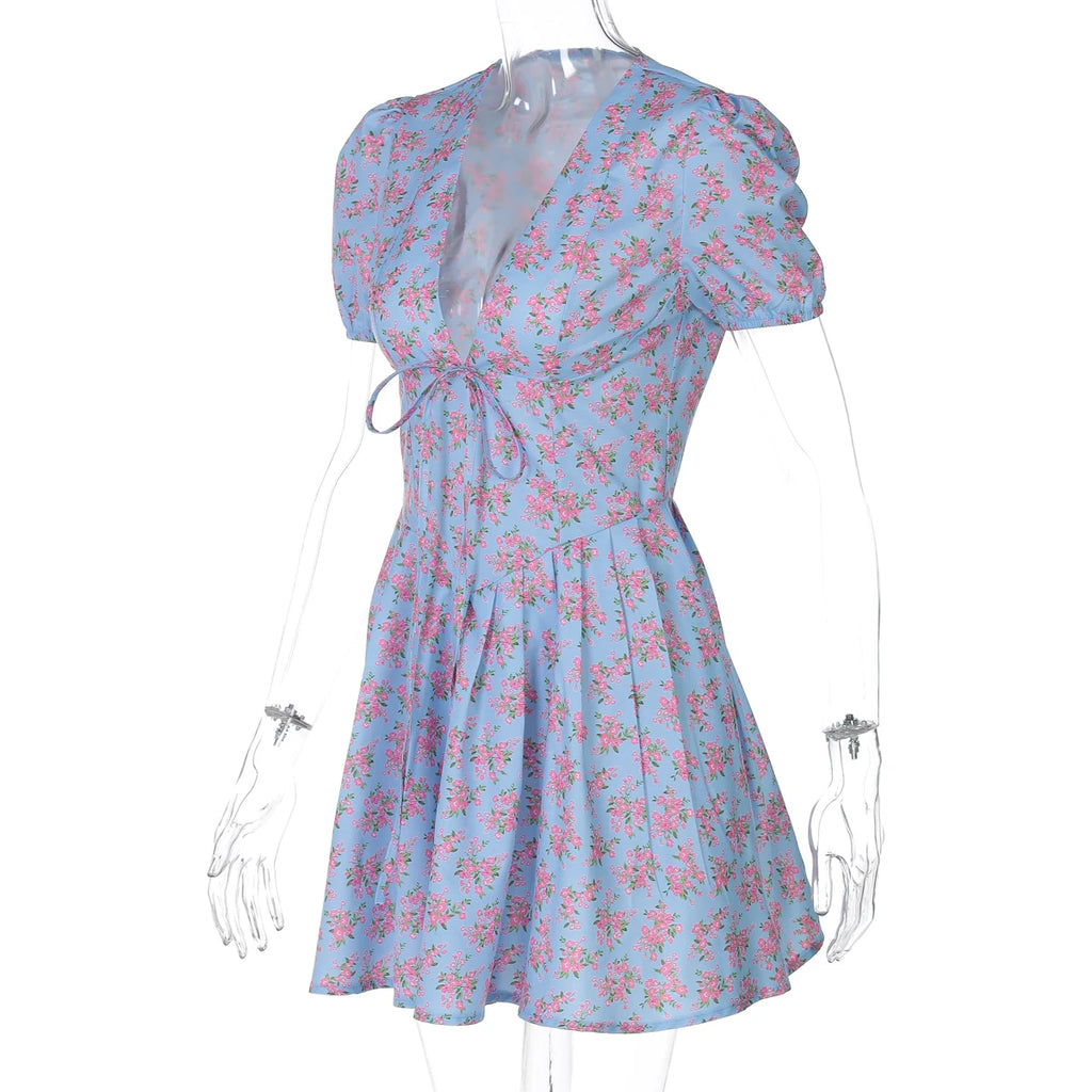 Hugcitar 2026 Floral Print V Neck Short Sleeve Lace Up Zip Up Sexy Slim Pleated Mini Dress Summer Elegant Outfits Party Vacation