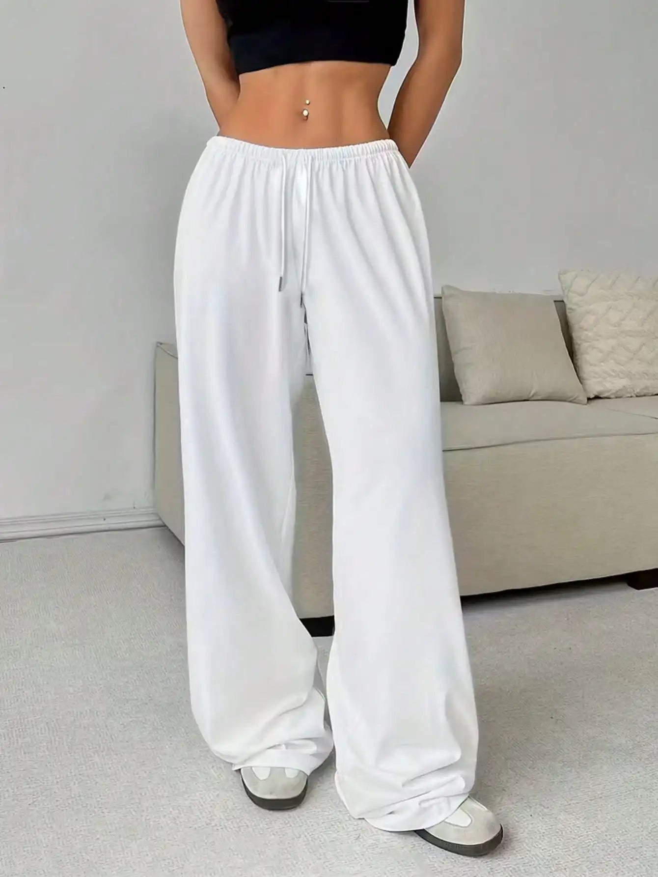 Ladies' casual wide-leg jogging pants, featuring a drawstring elastic waistband, comfortable and loose fit, and a popular style