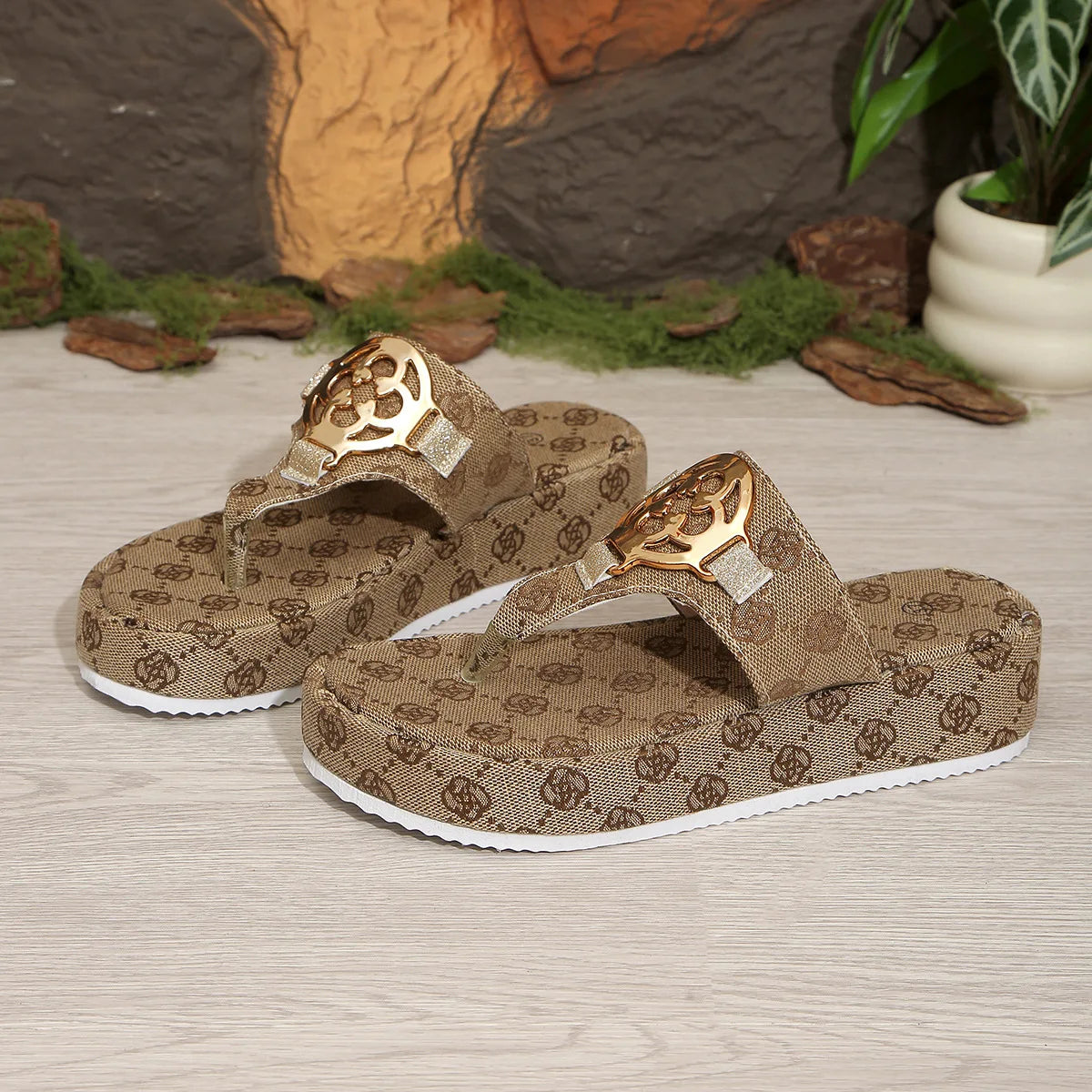 e thick-soled one-piece embroidered metal buckle flip-flops for women, suitable for casual outdoor wear as beach sandals.