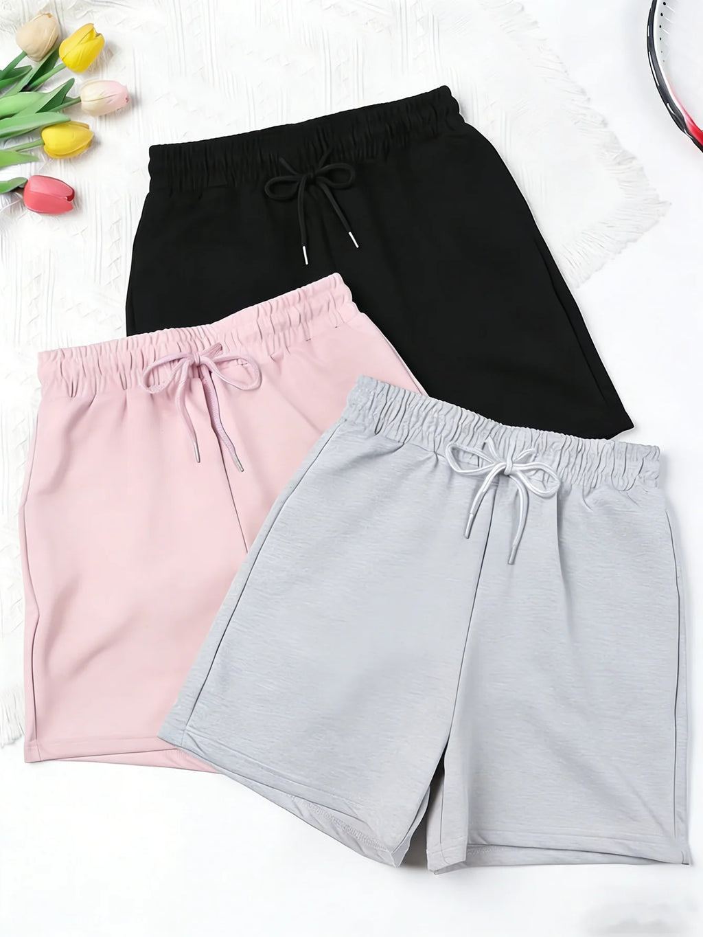 Three Women's Simple Drawstring Sports Shorts, Suitable for Wearing as Outerwear in a Casual Style, Are Comfortable and Soft.