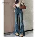 Women's stylish denim jeans, stretchy blue-gray with frayed edges, slit, high-waisted, leg-lengthening, flared