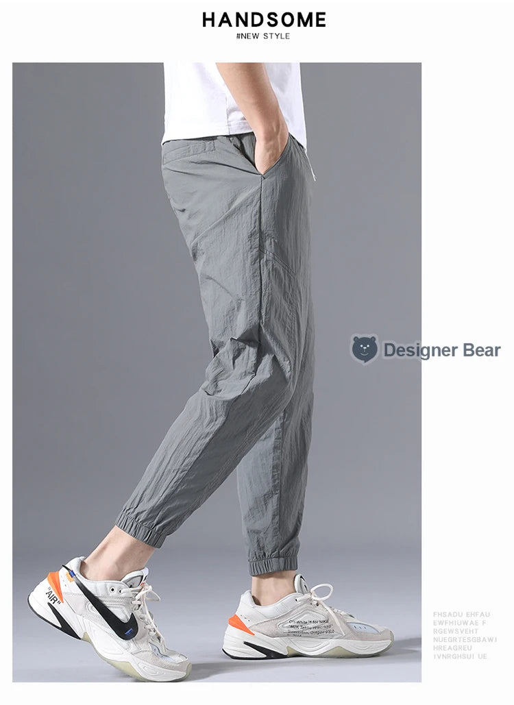 2026 Summer Thin Men's Wrinkled Fabric Loose Tapered Harem Pants Quick-Dry Elastic Cuff Casual Trousers Elastic Waist City Boy