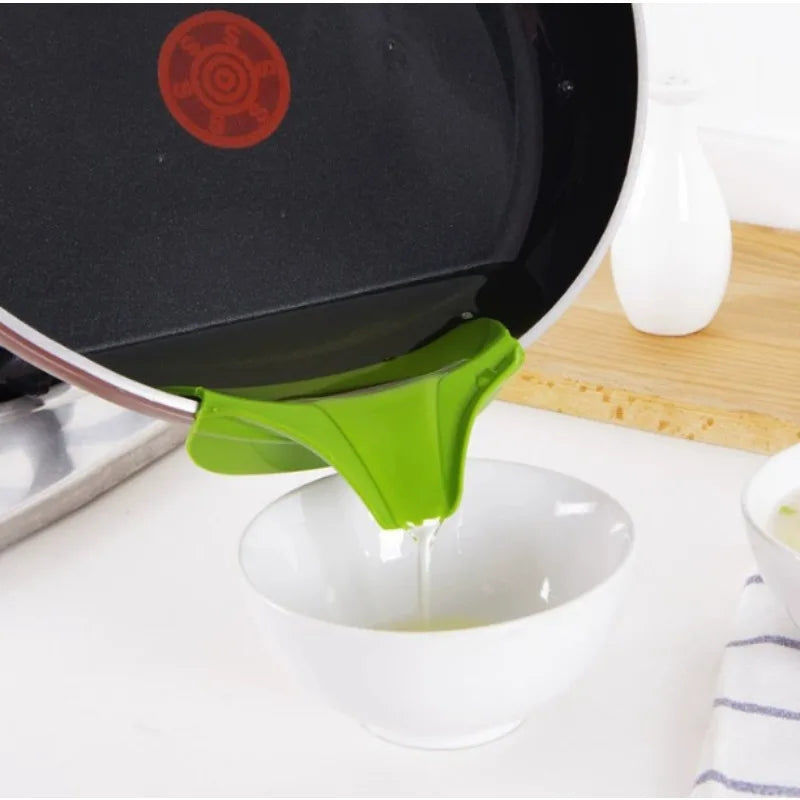 Kitchen Tools Designed to Prevent Spills, Including Pots with Round Openings, Edge Guards,  And Various Small Kitchen Gadgets