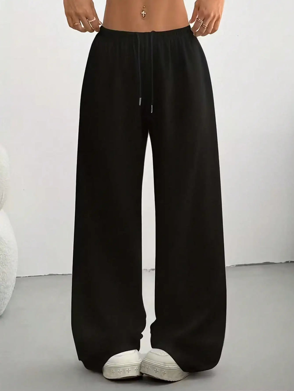 Ladies' casual wide-leg jogging pants, featuring a drawstring elastic waistband, comfortable and loose fit, and a popular style