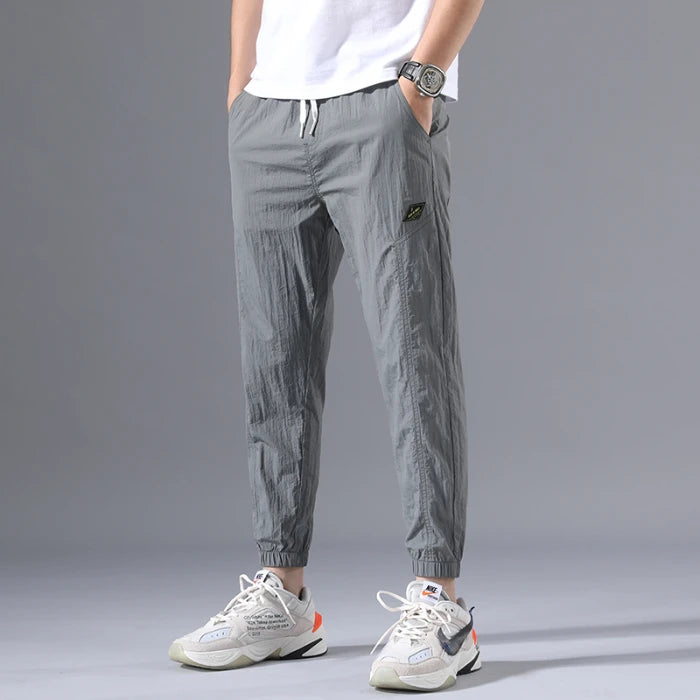 2026 Summer Thin Men's Wrinkled Fabric Loose Tapered Harem Pants Quick-Dry Elastic Cuff Casual Trousers Elastic Waist City Boy