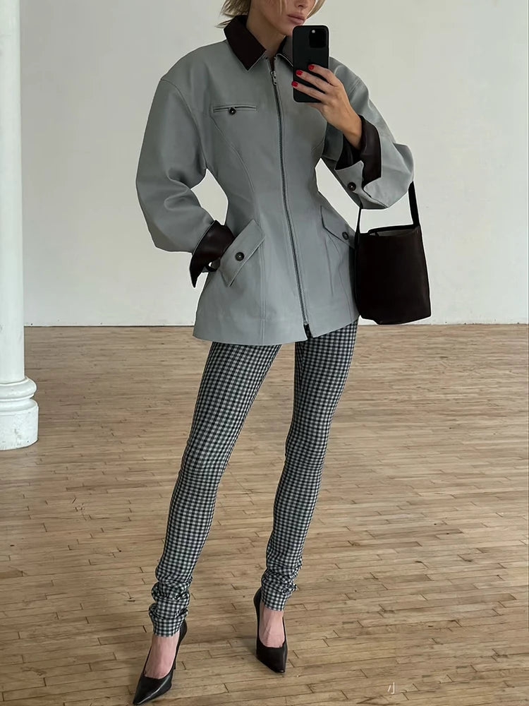 Leather-paneled jacket, a vintage, old-money style contrasting color lapel long-sleeved women's jacket.