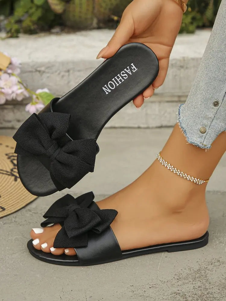 Womens Slip on Flat Sandals Big Bowknot Wide Strap Slides Mules Open Toe Casual Sweet Summer Beach Comfort Daily Walking Shoes