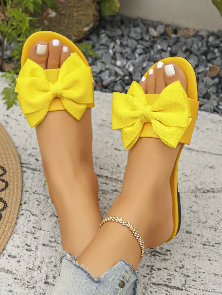 Womens Slip on Flat Sandals Big Bowknot Wide Strap Slides Mules Open Toe Casual Sweet Summer Beach Comfort Daily Walking Shoes