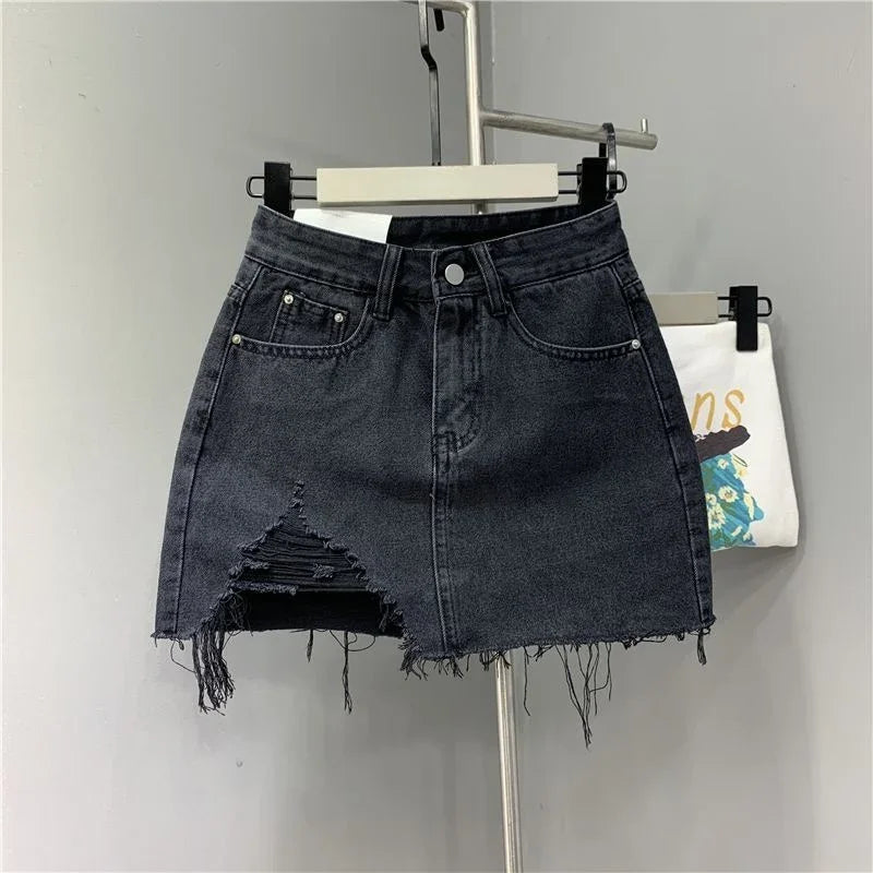 Washed and Worn Out Irregular Denim Half Body Skirts.New Summer Fashion and Individual High-waisted Denim Short Skirt for Women