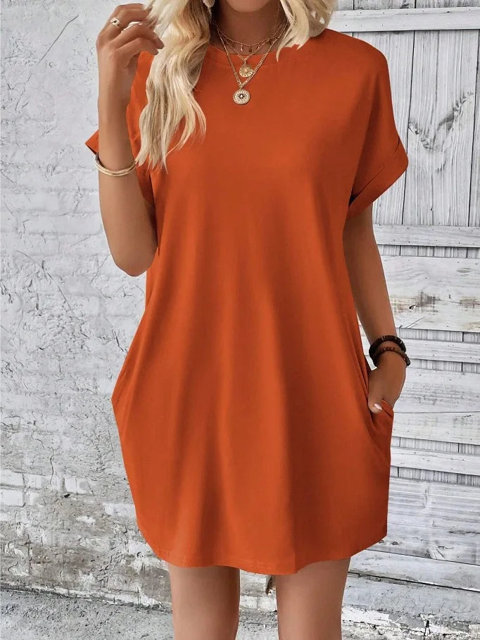 New women's spring and summer fashionable temperament casual commuting solid color round neck loose short sleeved pocket dress