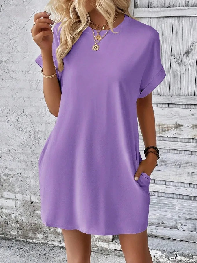 New women's spring and summer fashionable temperament casual commuting solid color round neck loose short sleeved pocket dress