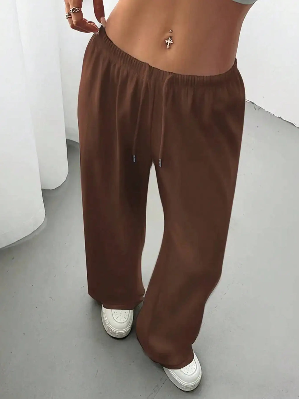Ladies' casual wide-leg jogging pants, featuring a drawstring elastic waistband, comfortable and loose fit, and a popular style