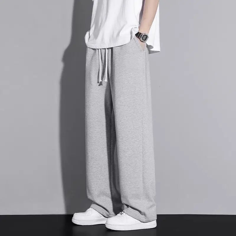 Men's Casual Straight Leg Drawstring Sweatpants Versatile Leisure Long Trousers Student Sports Pants Polyester Fiber Elastic
