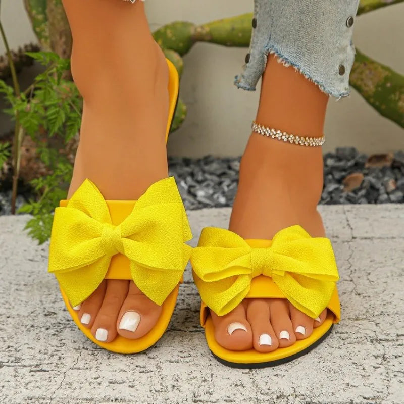 Womens Slip on Flat Sandals Big Bowknot Wide Strap Slides Mules Open Toe Casual Sweet Summer Beach Comfort Daily Walking Shoes