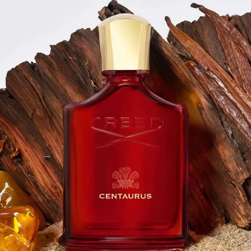 Creed Centaurus EDP with iconic red bottle. Spicy woody base enriched with smoky layers. Solid and steady aroma with great lasting power. A mature fragrance for lovers of deep, grounded scents.