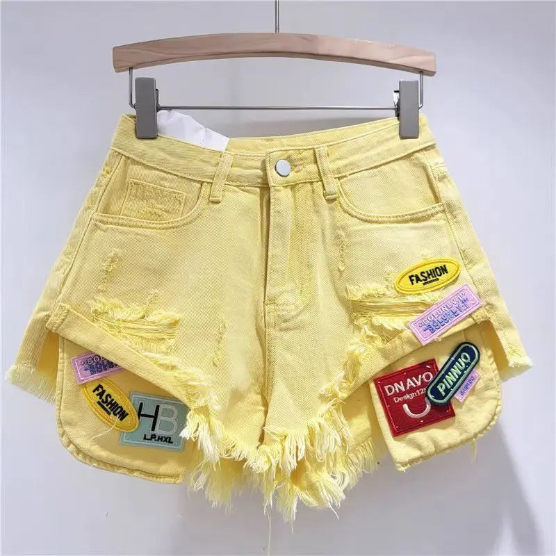 2026 Summer fringed Denim Hot pants Women's Streetwear Fashion Sexy Fringed Slimming Denim hot pants Personality Ripped Shorts