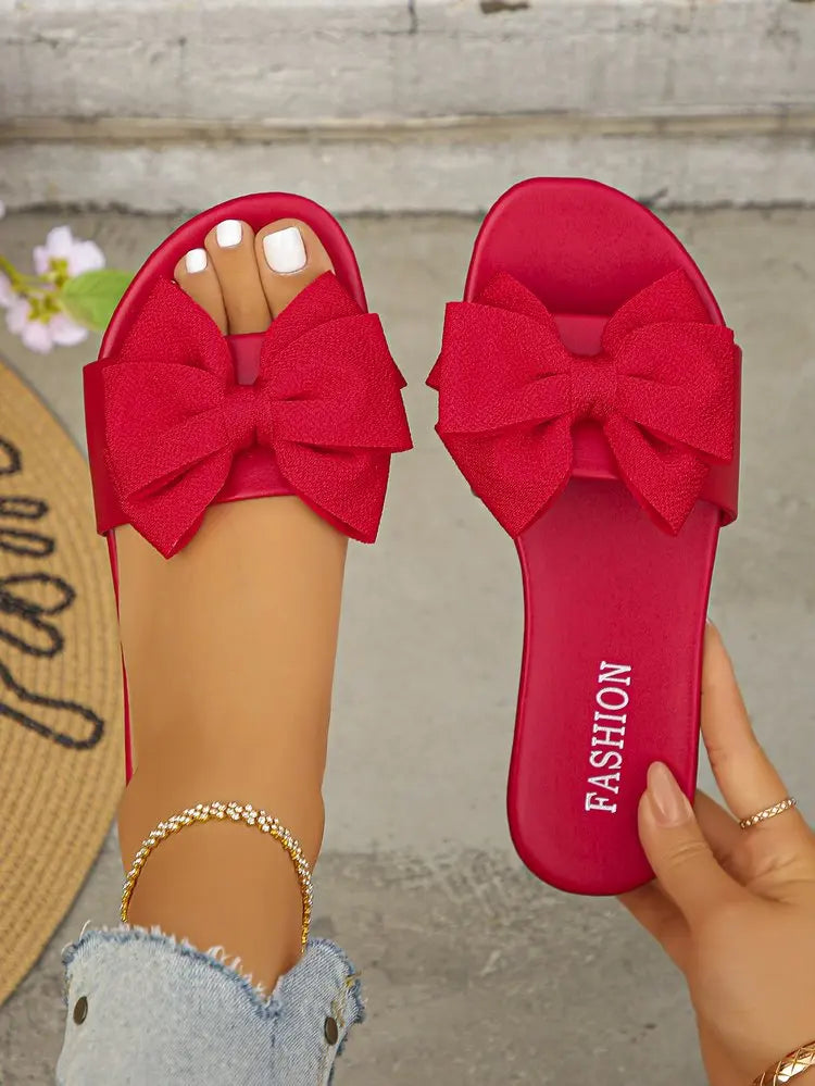 Womens Slip on Flat Sandals Big Bowknot Wide Strap Slides Mules Open Toe Casual Sweet Summer Beach Comfort Daily Walking Shoes