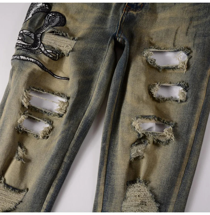 2026 New Men's Fashion Snake Embroidery Denim Jeans Vintage Blue Snakeskin Leather Patch Stretch Pants Skinny Tapered Trousers