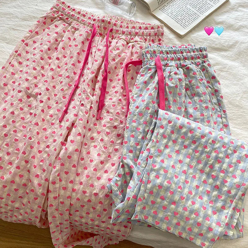 Comfortable home-style heart-printed pajama pants 2025 new casual family pants. The pink pants can be worn as a coat