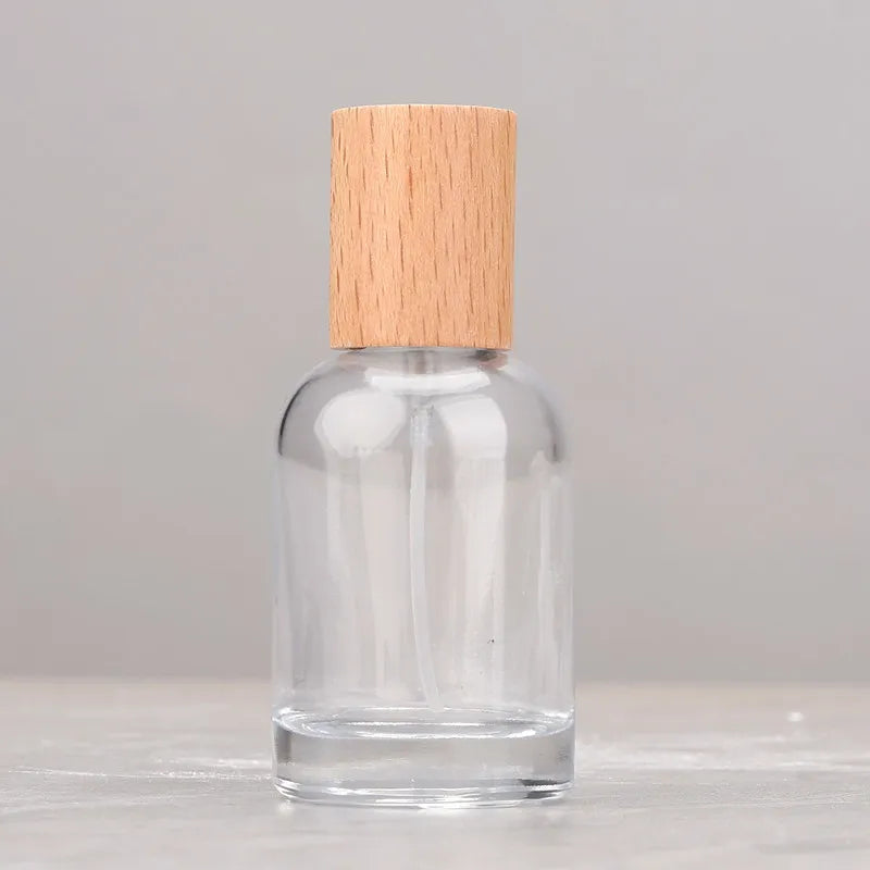 30/50/100ml Refillable Clear Glass Perfume Spray Bottles Fine Mist Atomizer with Sealed Cap Empty Fragrance Cosmetic Container