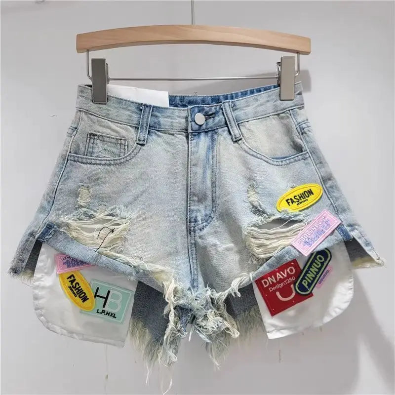 2026 Summer fringed Denim Hot pants Women's Streetwear Fashion Sexy Fringed Slimming Denim hot pants Personality Ripped Shorts