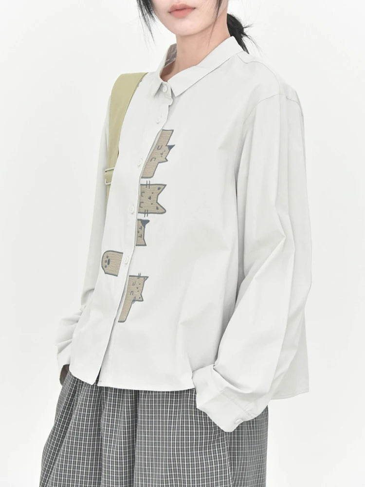 [EAM] Women White Pattern Patch Spliced Big Size Blouse New Lapel Long Sleeve Shirt Fashion Tide Spring Autumn 2026 1DJ6229