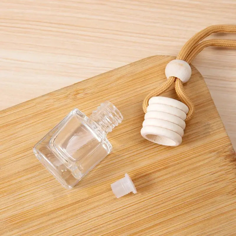 1Pcs Car Essential Oil Diffuser Fragrance Air Freshener Scent Perfume Bottle Ornament Small Round Cap Empty Bottle Pendant