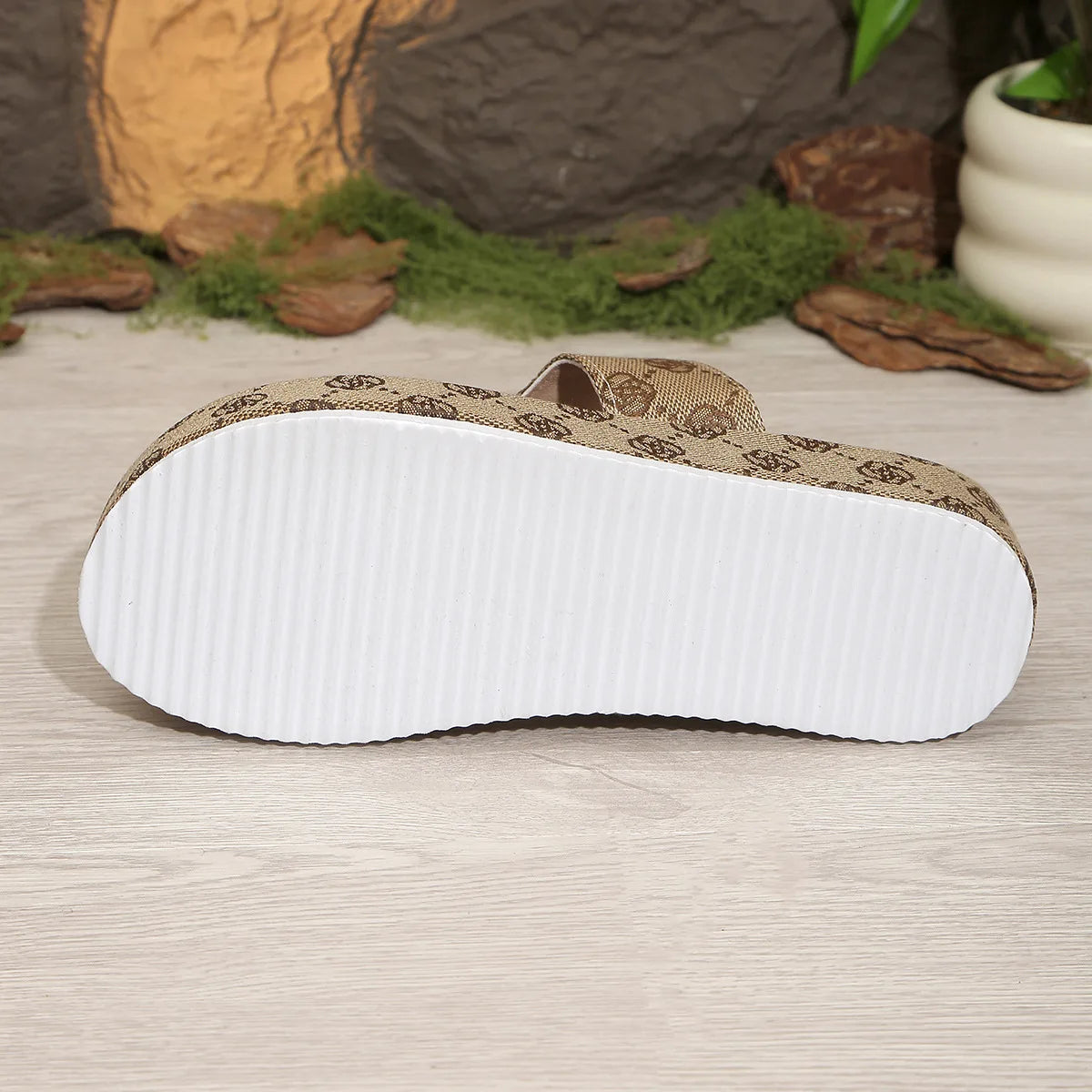 e thick-soled one-piece embroidered metal buckle flip-flops for women, suitable for casual outdoor wear as beach sandals.