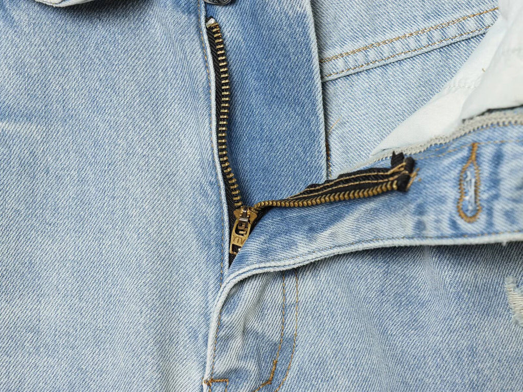 European and American style 2026 spring/summer new women's clothing mid waist casual ripped and flanged denim pants