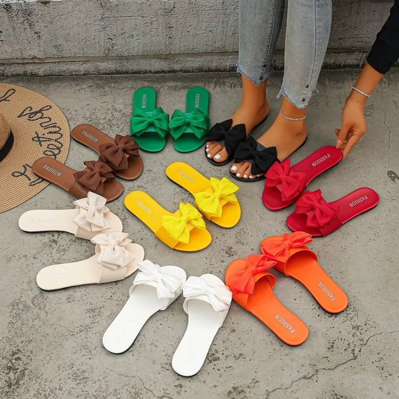 Womens Slip on Flat Sandals Big Bowknot Wide Strap Slides Mules Open Toe Casual Sweet Summer Beach Comfort Daily Walking Shoes