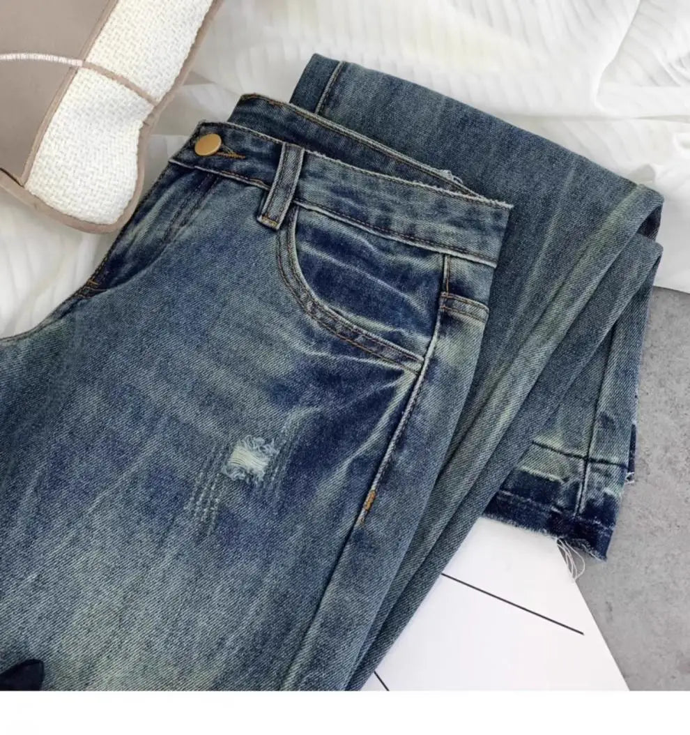 American retro low-waisted jeans female autumn new embroidery old casual fashion temperament slim Joker bell bottoms.