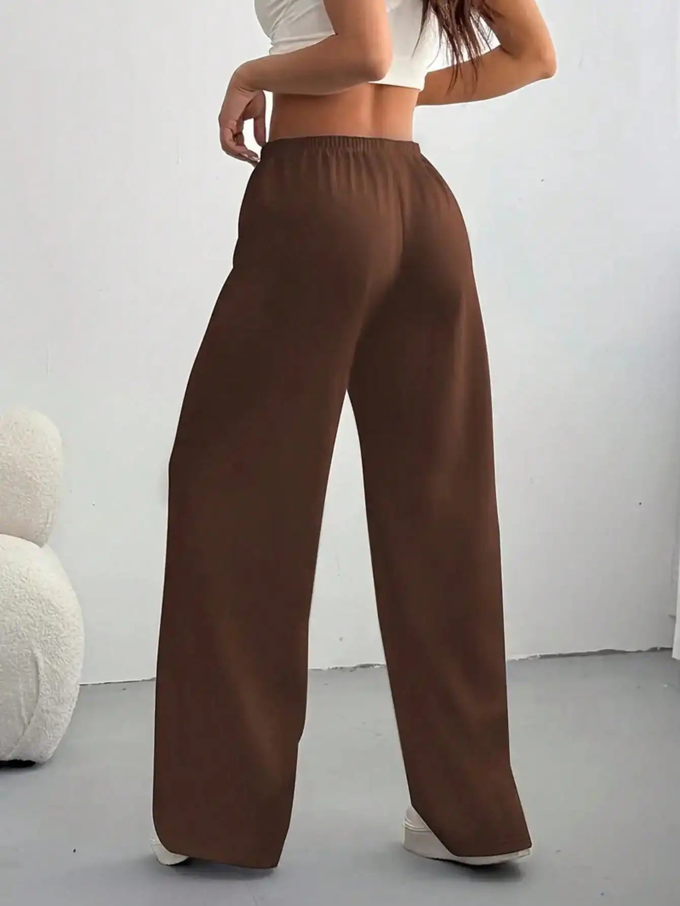 Ladies' casual wide-leg jogging pants, featuring a drawstring elastic waistband, comfortable and loose fit, and a popular style