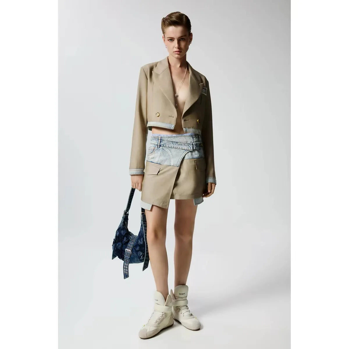 Foreign trade Spain original single color collision splicing denim asymmetrical design short skirt fashion
