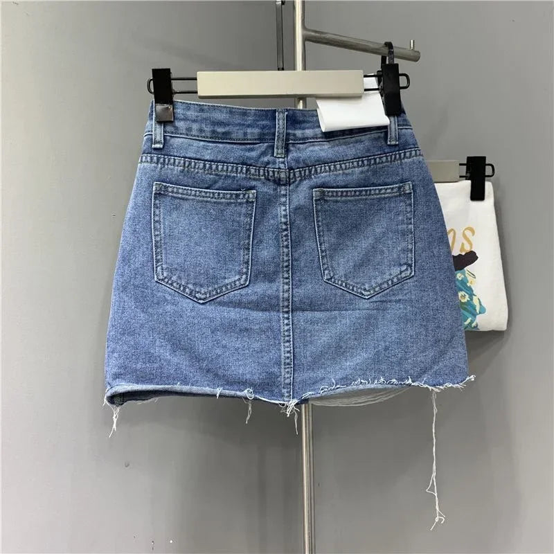 Washed and Worn Out Irregular Denim Half Body Skirts.New Summer Fashion and Individual High-waisted Denim Short Skirt for Women