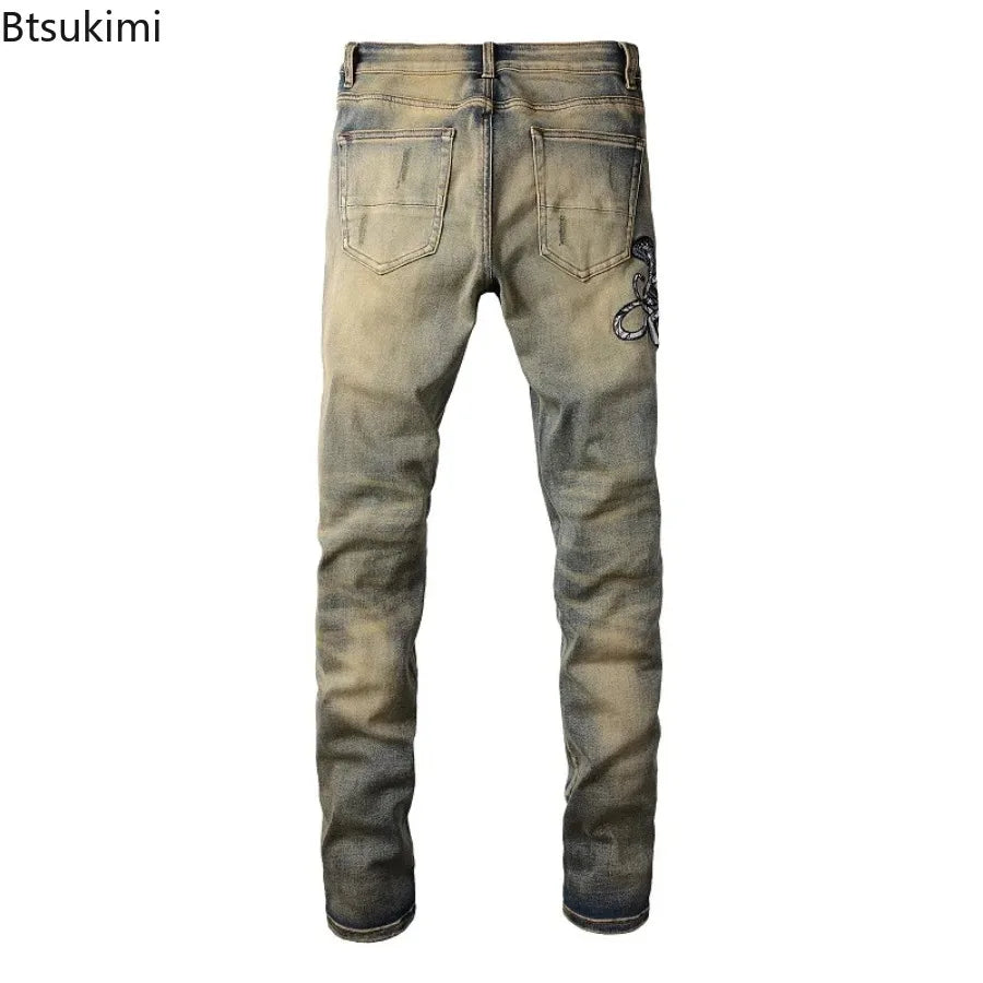 2026 New Men's Fashion Snake Embroidery Denim Jeans Vintage Blue Snakeskin Leather Patch Stretch Pants Skinny Tapered Trousers