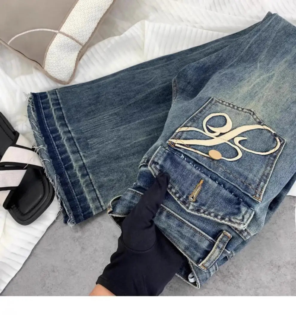 American retro low-waisted jeans female autumn new embroidery old casual fashion temperament slim Joker bell bottoms.